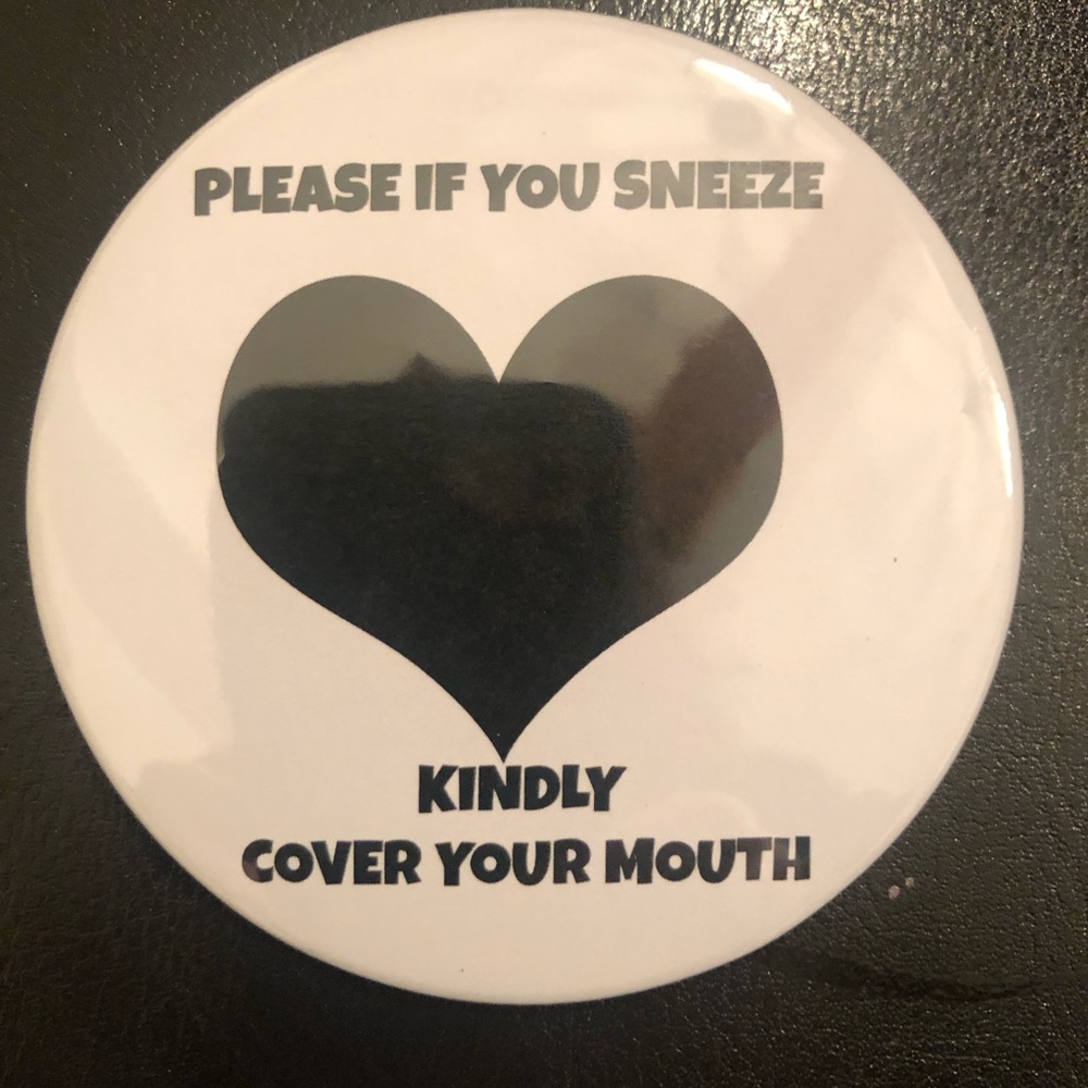 button you can wear at school, airports, on a plane, at work or anywhere else.